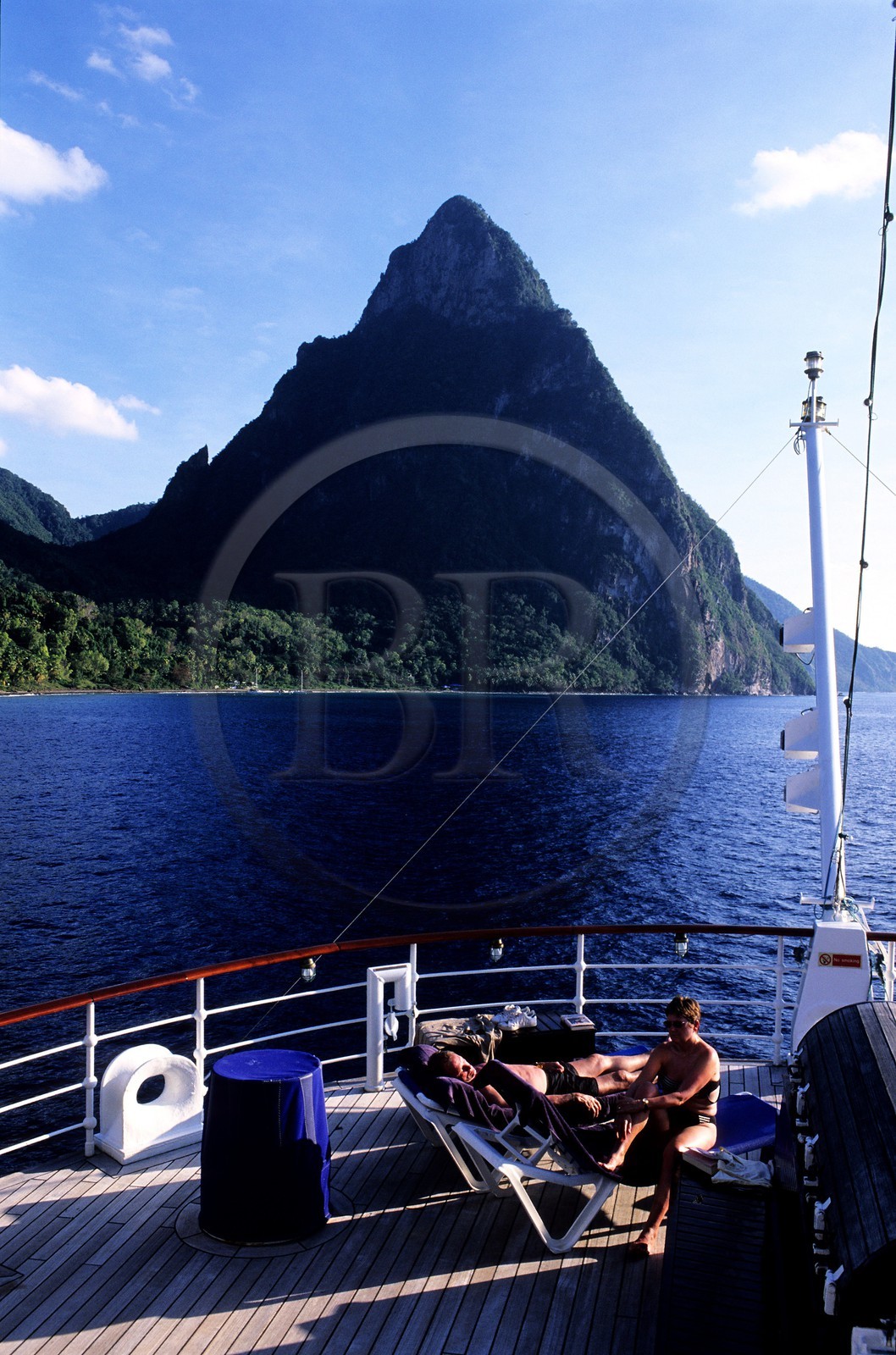 Caribbean sea, Saint Lucia island, the five masted ship SPV Royal Clipper with every sail set in front of the Piton of Soufriere