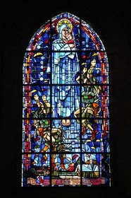 France, Manche, Cotentin, Sainte Mere Eglise, stained glass showing the Virgin Mary surrounded by parachutists in memory of the landing of D day