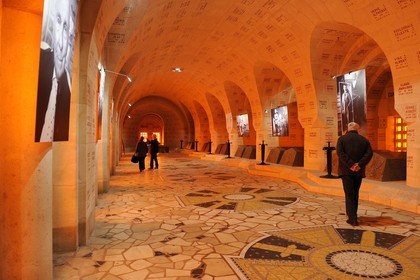 France, Meuse, Verdun area, Douaumont, Douaumont Ossuary,National Necropolis, cloister housing the tombs representing geographic areas of the Battle of Verdun which are engraved the names of fallen soldiers