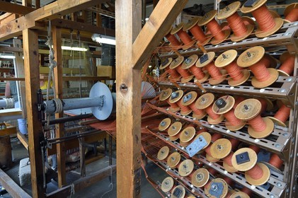 France, Var, Presqu'ile de Saint Tropez, Cogolin, the Manufacture Cogolin has been making rugs since 1924, most of them are woven by length on 19th century Jacquard hand looms, spools of threads