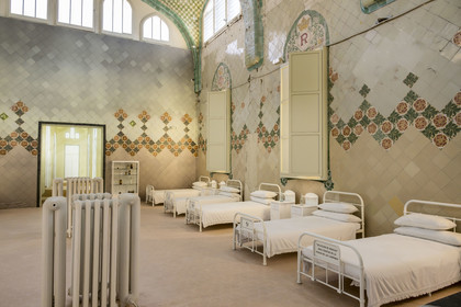 Spain, Catalonia, Barcelona, El Guinardo district, former Hospital de la Santa Creu i de Sant Pau listed as UNESCO World Heritage, modernist style by architect Domenech i Montaner, today a museum and a cultural center, the Saint Raphaël (Sant Rafael) pavilion which welcomed patients with digestive problems