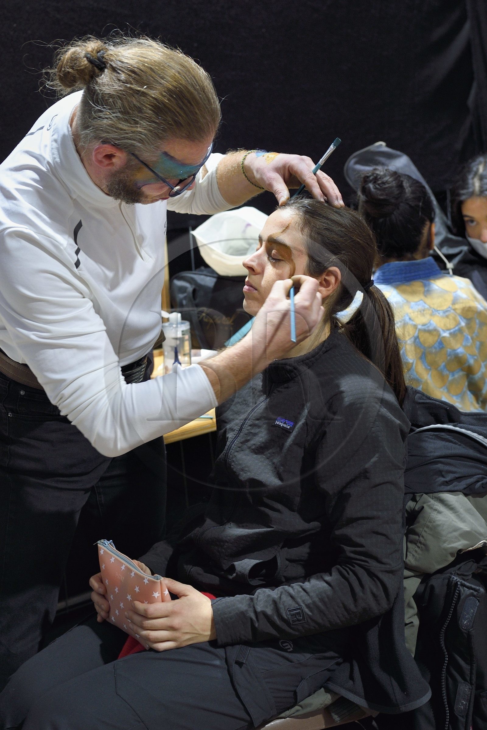 France, Meurthe-et-Moselle, Nancy, preparations for the parade of Saint-Nicolas place Carnot, make-up session for the Company Remue Ménage