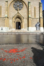 Bosnia and Herzegovina, Sarajevo, catholic Sacred Heart Cathedral (Katedrala Srca Isusova), the Sarajevo Rose is a concrete scar caused by a mortal mortar shell's explosion that was later filled with red resin