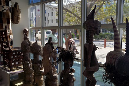 Namibia, Khomas region, Windhoek, Independence Avenue, african art shop, masks and statues in showcase