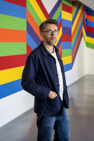 France, Vaucluse, Avignon, Collection Lambert, Museum of Contemporary Art, Stéphane Ibars, artistic director of the Collection in front of the work Incomplete Open Cube 5 11 (1973) lacquer on aluminum by artist Sol LeWitt