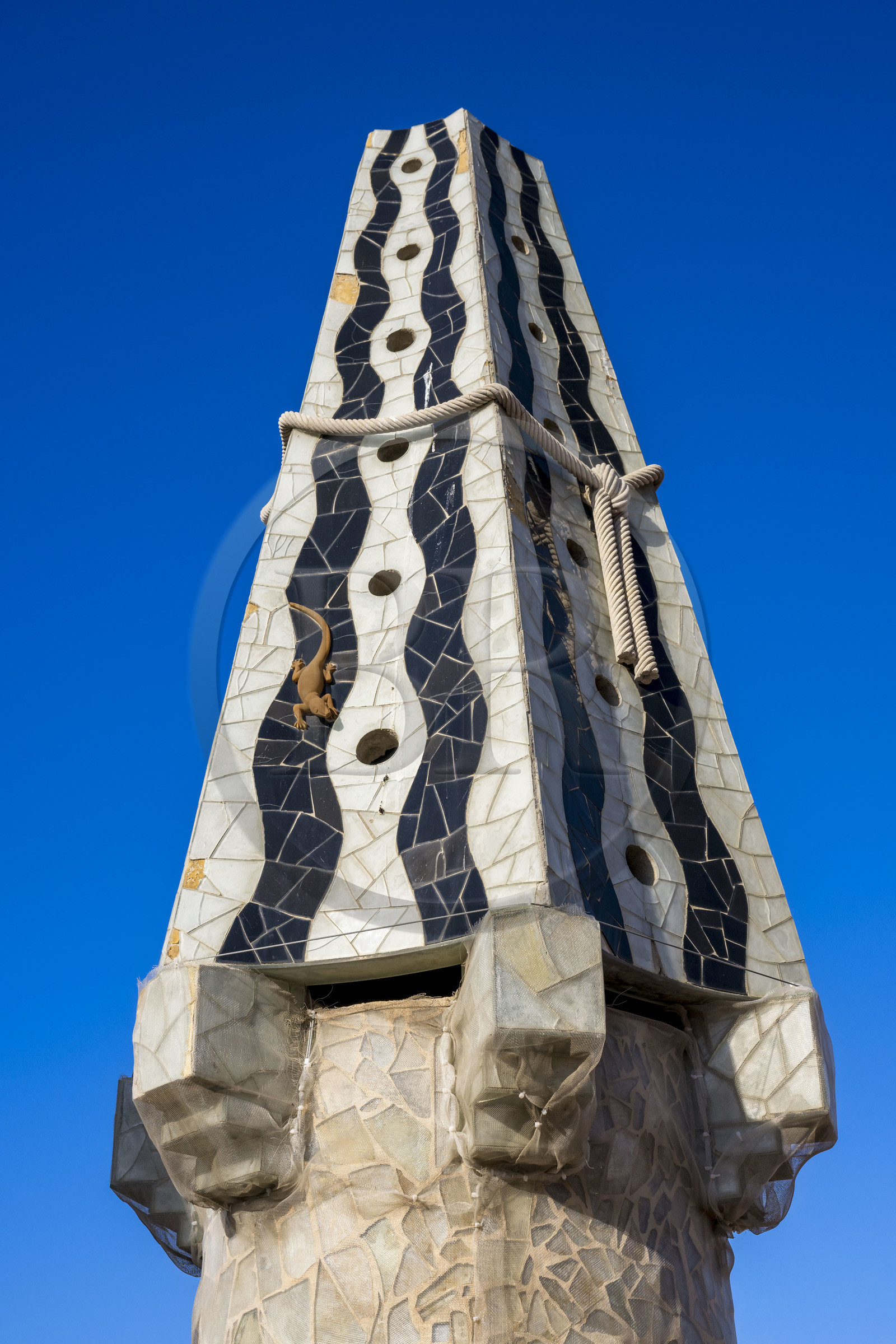 Spain, Catalonia, Barcelona, the Güell Palace (Palau Güell) built between 1886 and 1891 by the Catalan modernist architect Antoni Gaudi, a UNESCO World Heritage site, chimneys and ventilation towers on the roof terrace