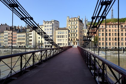 France, Rhone, Lyon, historical site listed as World Heritage by UNESCO, Quai Bondy and the Saint Vincent Footbridge over the Saone River, Saint Paul church, Notre Dame de Fourviere Basilica and the Metal Tower in the background
