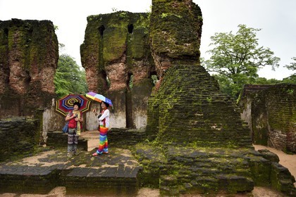 Sri Lanka,  North Central province, Polonnaruwa, the former capital of the country (11th to 13th century) listed as World Heritage by UNESCO, Chinese tourists in front of the Royal Palace ruins