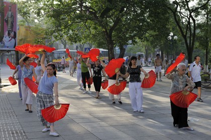 Vietnam, Hanoi, old town, Hoan Kiem Lake also called the small lake or Lake of the Restored Sword, people doing Tai chi