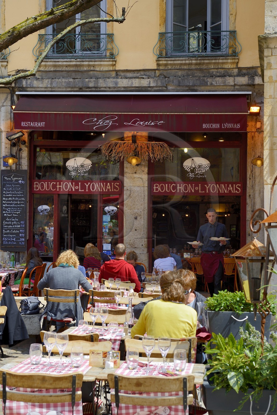 France, Rhone, Lyon, historical site listed as World Heritage by UNESCO, St. Paul neighborhood in the Vieux Lyon (Old Town), Place du Change and Bouchons Lyonnais (typical and traditional restaurants of Lyon)