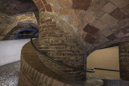 Spain, Catalonia, Barcelona, the Güell Palace (Palau Güell) built between 1886 and 1891 by the Catalan modernist architect Antoni Gaudi, a UNESCO World Heritage site, spiral staircase leading to the basement
