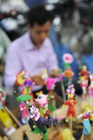 Vietnam, Hanoi, hand made candies for children