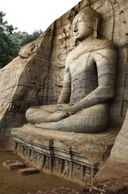 Sri Lanka,  North Central province, Polonnaruwa, the former capital of the country (11th to 13th century) listed as World Heritage by UNESCO, huge buddha cut in rock of Gal Vihara, seated Buddha with clasped hands cupped in dhyana mudra meditation position