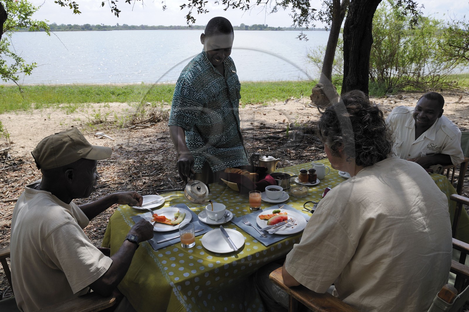 Tanzania, Selous Game Reserve is one of the largest fauna reserves of the world and designated a UNESCO World Heritage Site in 1982, the very exclusive Selous Camp, breakfast in the bush
