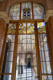 Spain, Catalonia, Barcelona, El Guinardo district, former Hospital de la Santa Creu i de Sant Pau listed as UNESCO World Heritage, modernist style by architect Domenech i Montaner, today a museum and a cultural center, administration building, one of the two galleries of the administration building with mosaics on the ceiling