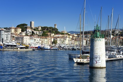 France, Alpes-Maritimes, the old town in Le Suquet district overlooking the port, at its peak the Tour du Suquet and the steeple of the Notre-Dame-de-l'Esperance church