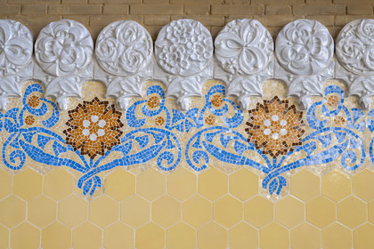 Spain, Catalonia, Barcelona, El Guinardo district, former Hospital de la Santa Creu i de Sant Pau listed as UNESCO World Heritage, modernist style by architect Domenech i Montaner, today a museum and a cultural center, administration building, decorative mosaics on the wall