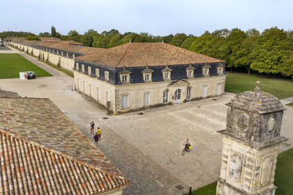France, Charente Maritime, Rochefort, International Sea Center in the former maritime Arsenal of Rochefort, the Corderie Royale designed by Colbert in 1666 on the banks of the Charente river (aerial view)