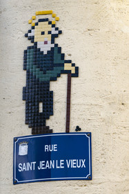 France, Vaucluse, Avignon, Saint-Jean in enamel to decorate the street sign of rue Saint-Jean-le-Vieux by the street artist Mifamosa