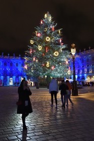 France, Meurthe-et-Moselle, Nancy, place Stanislas (former Place Royale) during the feast of Saint-Nicolas, listed as World Heritage by UNESCO, the large decorated Christmas tree and the Town Hall in the background