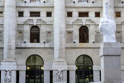 Italy, Lombardy, Milan, the finger drawn up in front of the Milan Stock Exchange by the sculptor Maurizio Cattelan
