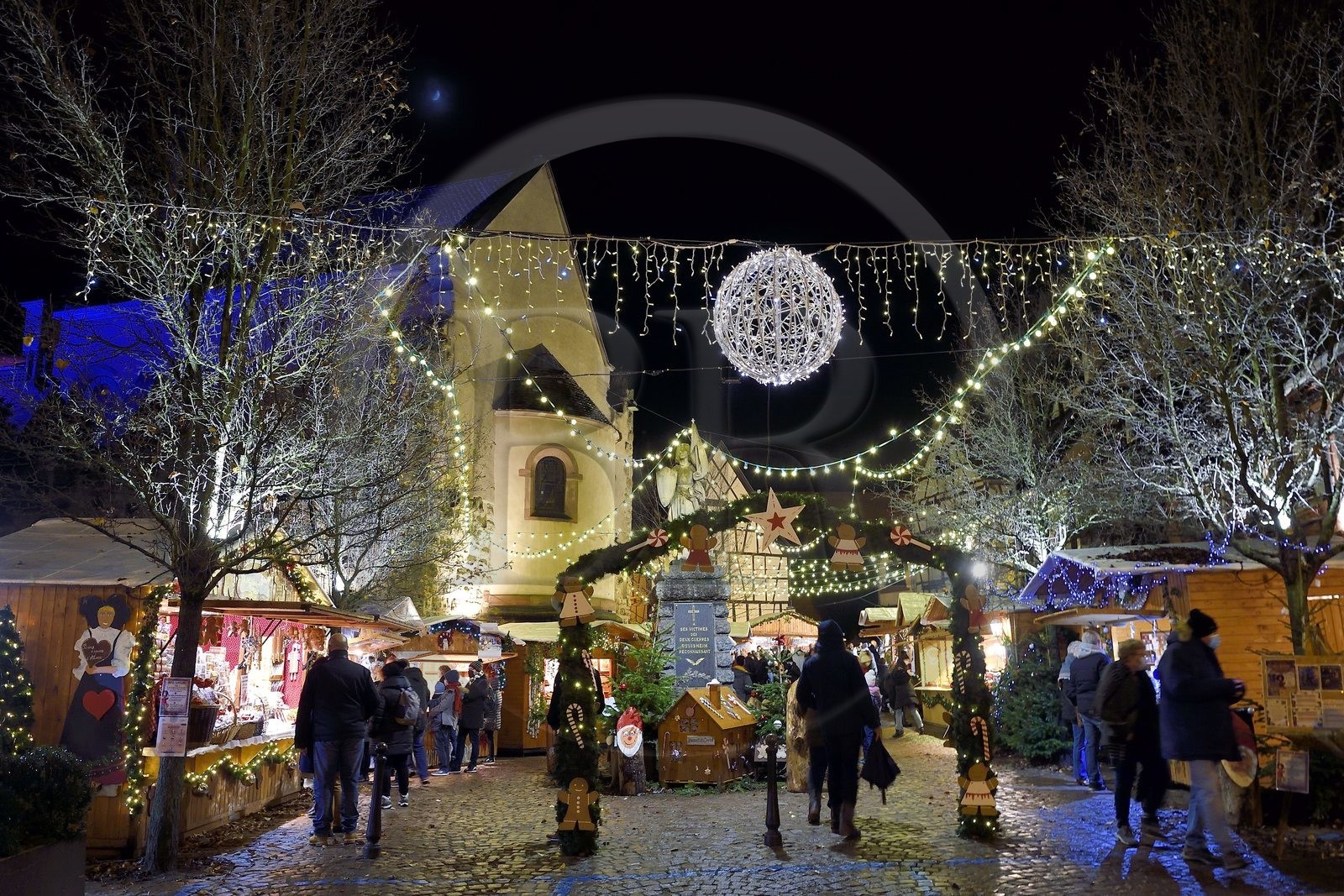France, Haut Rhin, Eguisheim, labelized Les Plus Beaux Villages de France (the Most Beautiful Villages of France), stalls Christmas lights and decorations on the Place du Chateau Saint-Leon