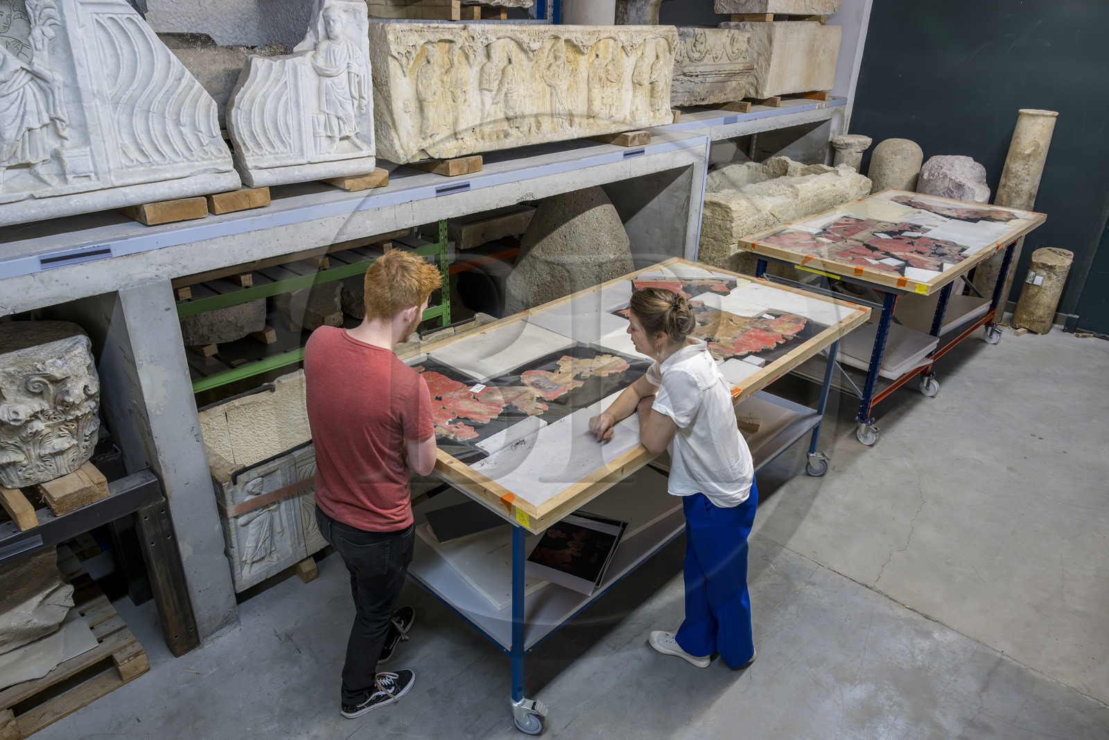 France, Bouches du Rhone, Arles, musée départemental Arles antique, in the museum reserves, from the excavations of the ruins of the harpist's house (between 70 and 50 BC) on the site of the old Trinquetaille glassworks on the right bank of the Rhone, assembly of fragments of the fresco wall painting adopting vermilion red with the most expensive pigment Cinnabar in the Roman world, the figure of a harpist who gave her name to the villa
