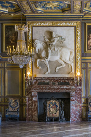 France, Seine-et-Marne, Fontainebleau, castle of Fontainebleau listed as World Heritage by UNESCO, the second Saint-Louis room or Salon du Donjon, the oldest room in the chateau, where the Languedoc marble fireplace decorated with an equestrian bas-relief representing Henri IV, made around 1600 by Matthieu Jacquet, has been moved