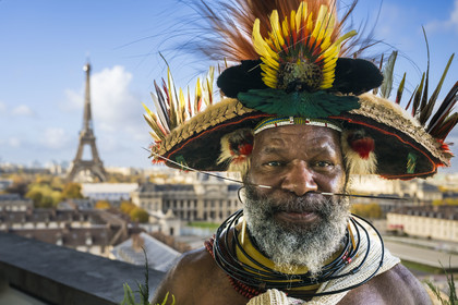 France, Paris, UNESCO Headquarters, Papuan Chief Mundiya Kepanga and the Eiffel Tower in the background