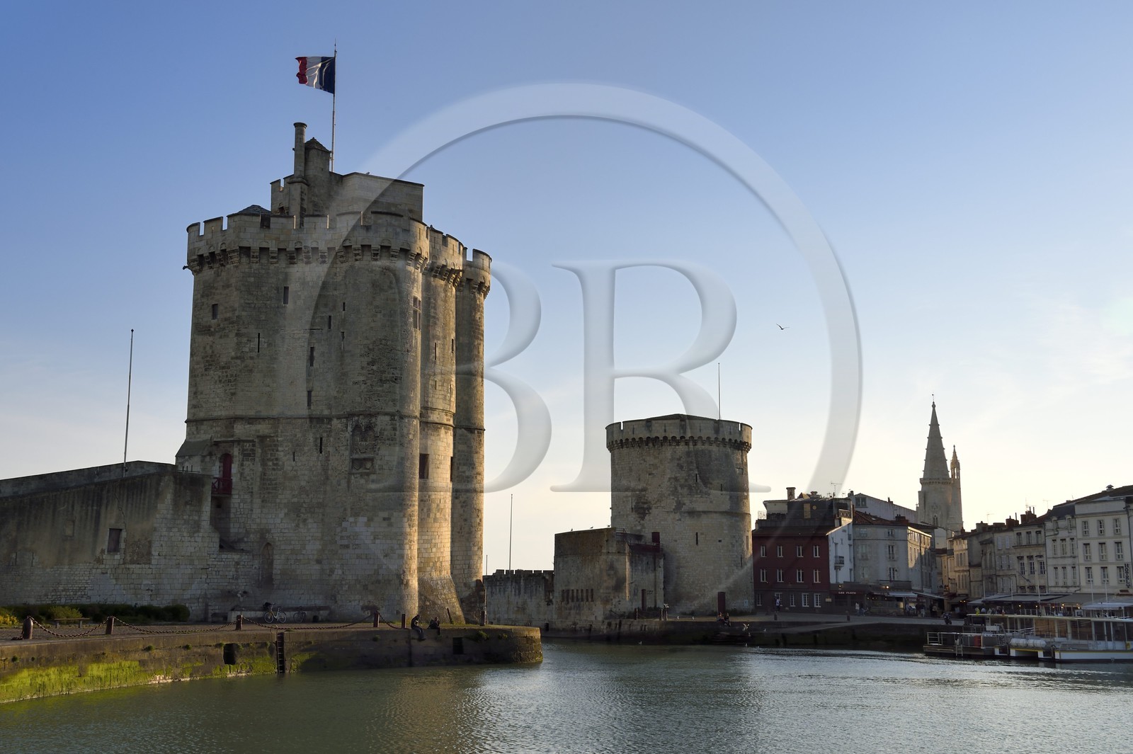 France, Charente-Maritime, La Rochelle, the Old Port, Tour Saint Nicolas and Tour de la Chaine protect the entrance to the Old Port, the tour de la Lanterne in the background