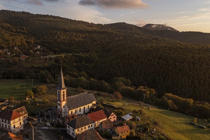 France, Haut Rhin, Thannenkirch, hiking in the Taennchel massif overlooking the village, the Haut Koenigsbourg Castle in the background  (aerial view)