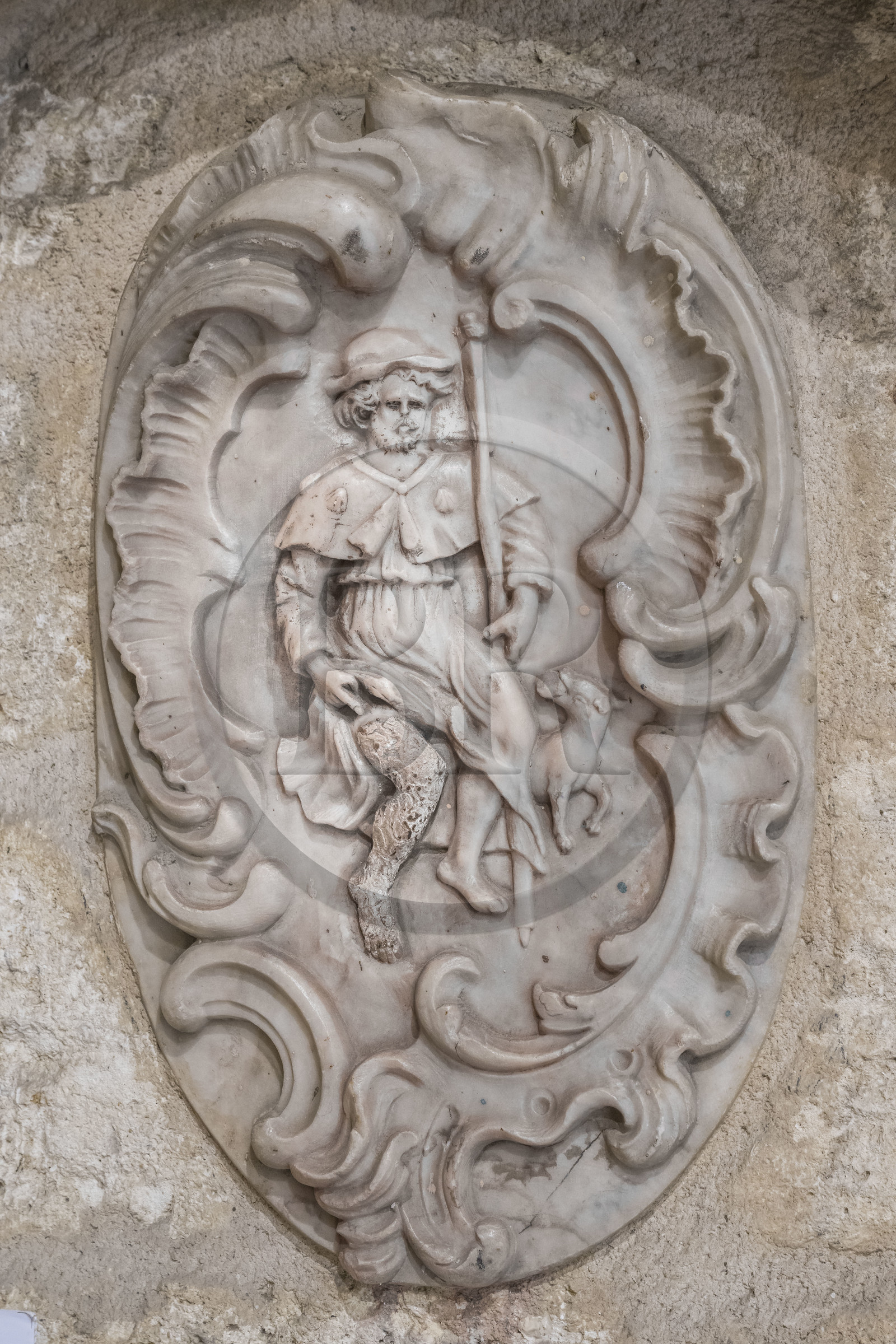 France, Herault, Montpellier, historic center called the Ecusson, Hotel de Varenne, private mansion dating from medieval times and home to the Museum of Old Montpellier, representation of Saint-Roch, holy healer of plague victims in the 14th century and saint of pilgrims, protector of the city