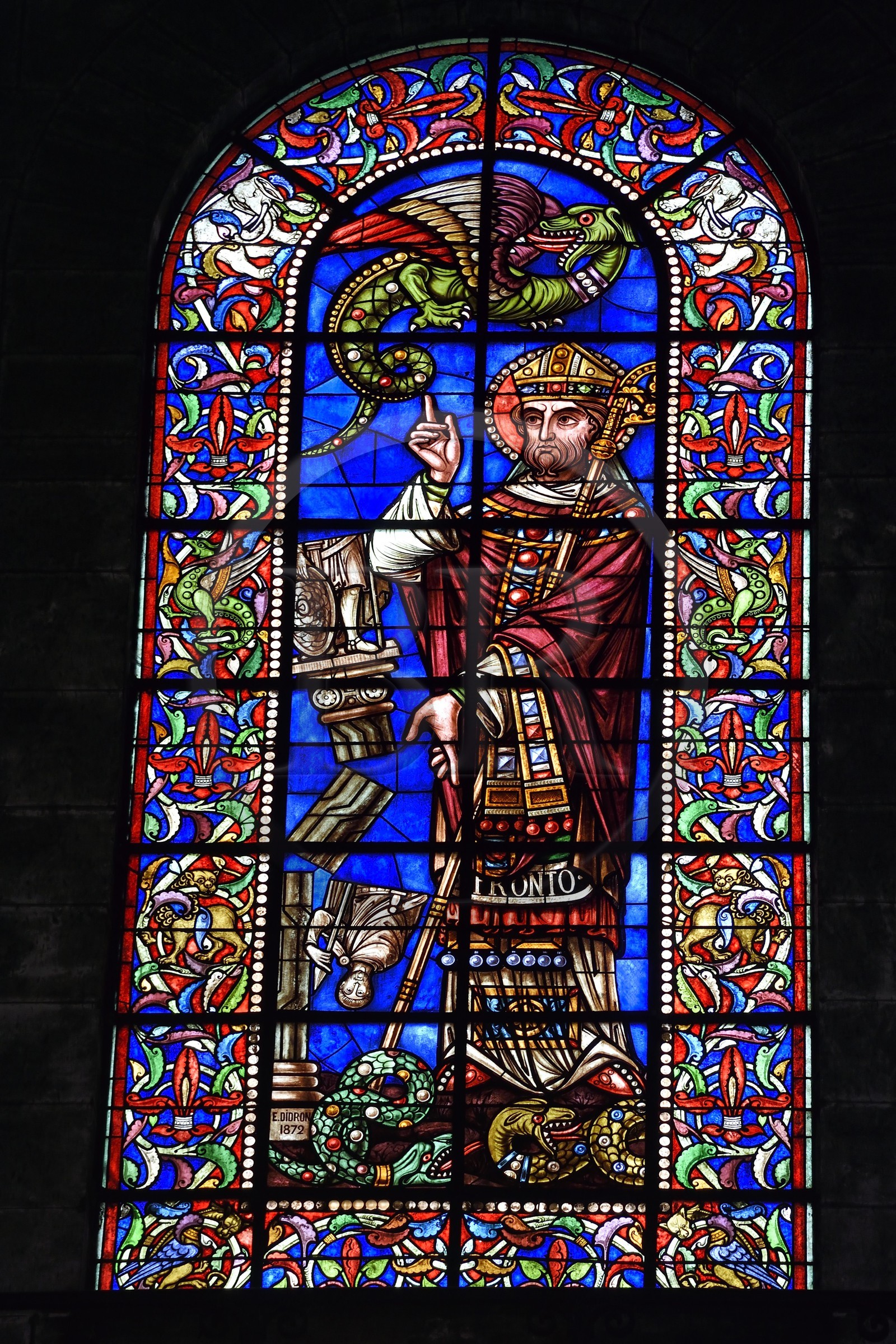 France, Dordogne, White Perigord, Perigueux, Saint Front Cathedral, stop on Route of Santiago de Compostela listed as World Heritage by UNESCO, stained glass window depicting Saint-Front reversing a pagan statue and chasing the dragon