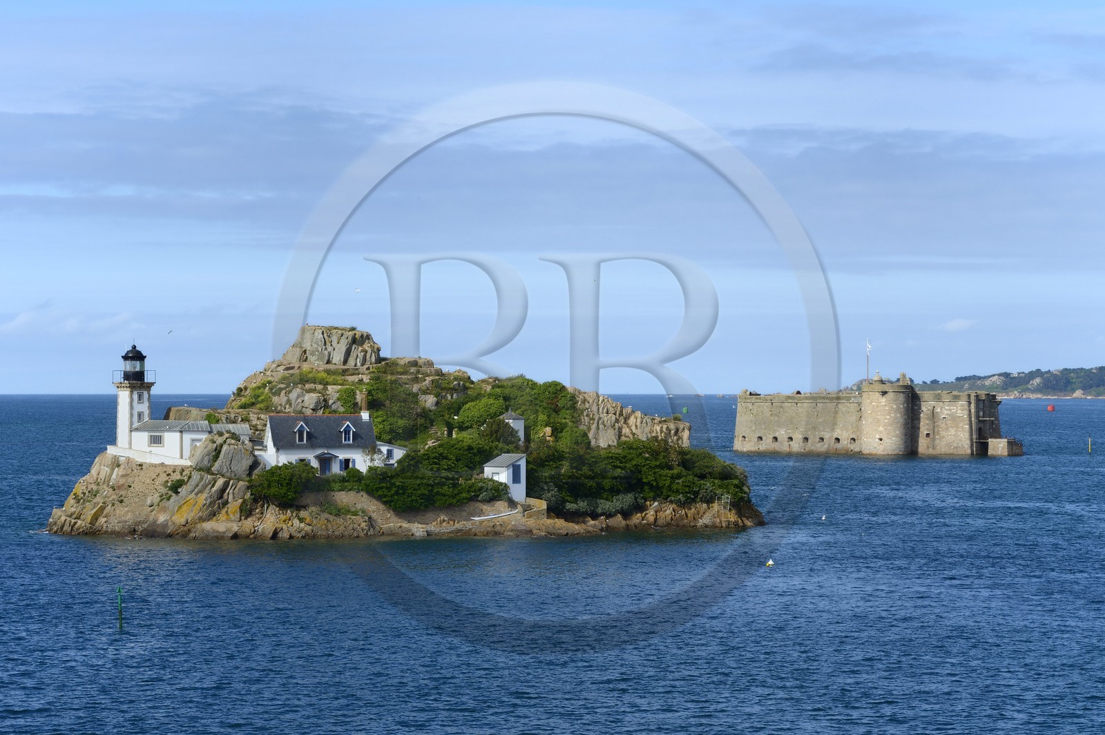 France, Finistere, Morlaix bay, Carantec, lighthouse of Louet island (also a guest house in summer) and the Chateau du Taureau