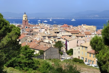 France, Var, Saint-Tropez, Notre Dame de l'Assomption parish church seen from the citadel, Grimaud in the background