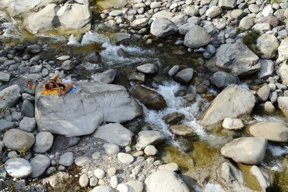 France, Haute Corse, Niolu (Niolo) region, swimming in the Golo river around the Genoese bridge Ponte Altu