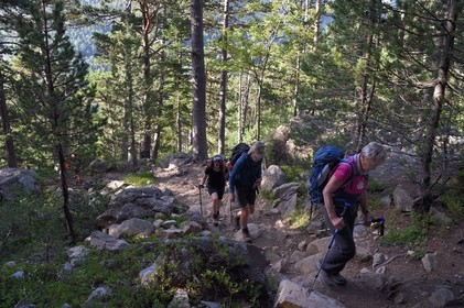France, Hautes Pyrenees, Saint Lary Soulan and Aragnouet, Neouvielle National Nature Reserve, Neouvielle lakes hike, hikers climbing to the Lacs des Laquettes