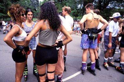 United States, New York City, Manhattan, Central Park, Roller skaters dancing next to the Pond