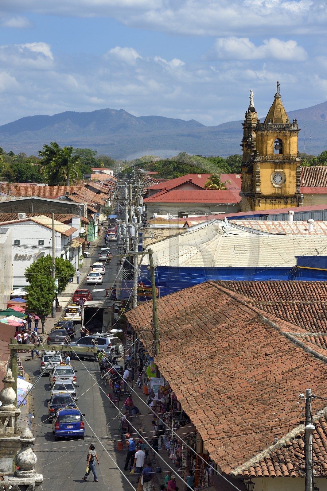 Nicaragua, Leon, Iglesia De La Recoleccion and the Telica volcano from the chain of volcanoes of the Cordillera Maribios (or Marrabios) in the background