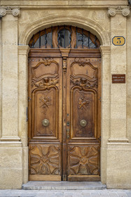 France, Bouches du Rhone, Aix en Provence, Place des Precheurs, the Madeleine church, Louis XV style walnut door of the Hotel de Gras mansion