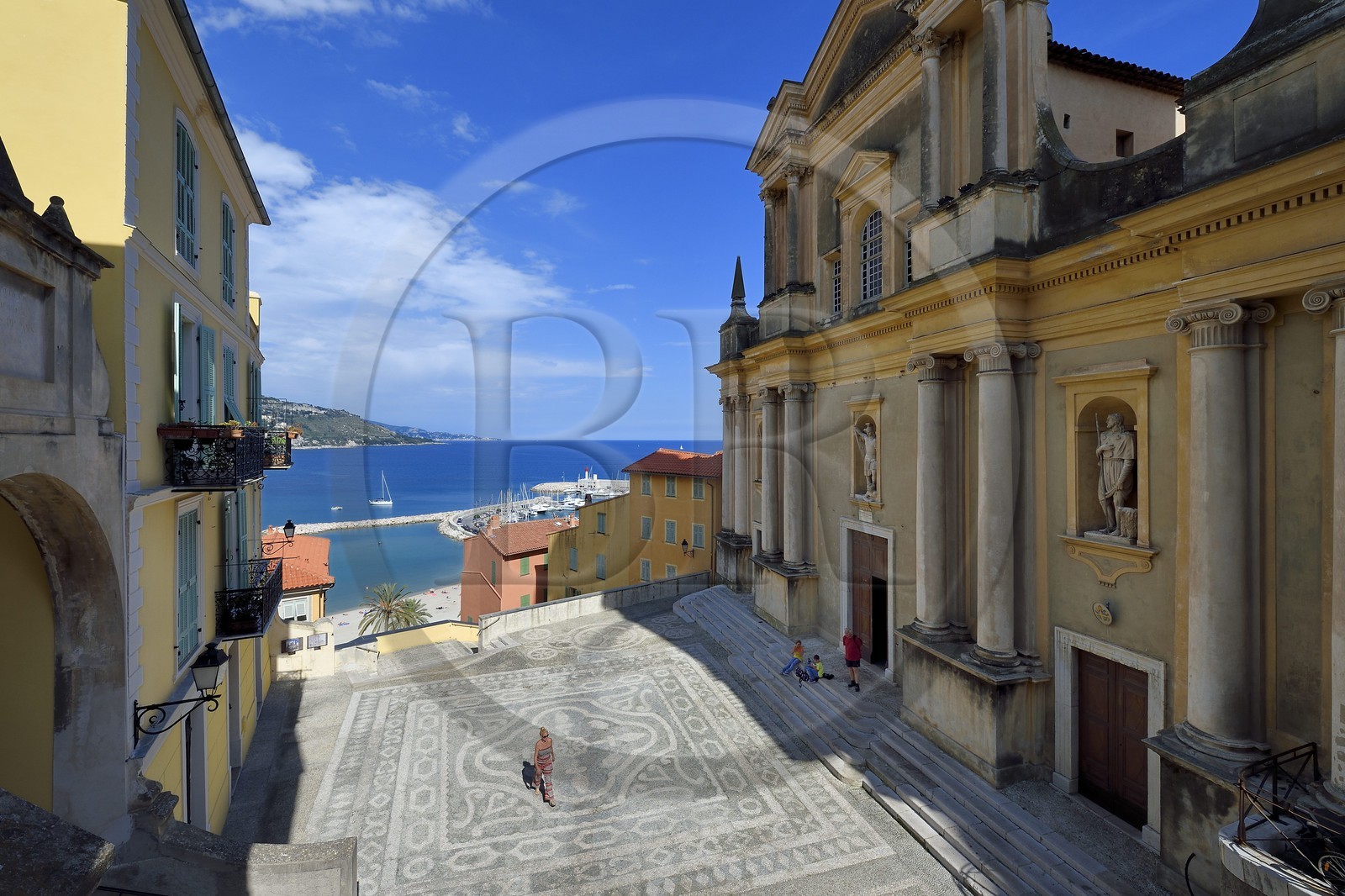 France, Alpes-Maritimes, Menton, old town, the parvis Saint-Michel and the basilique Saint Michel Archange (Saint Michael the Archangel Basilica) right