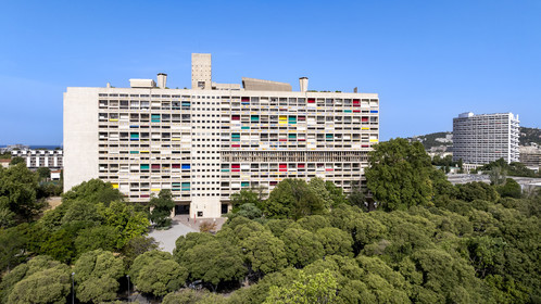 France, Bouches du Rhone, Marseille, architectural work of Le Corbusier, listed as World heritage by UNESCO, the Cité Radieuse by the architect Le Corbusier and the Le Brasilia building designed by the architect Fernand Boukobza under the influence of Le Corbusier in the background (aerial view)