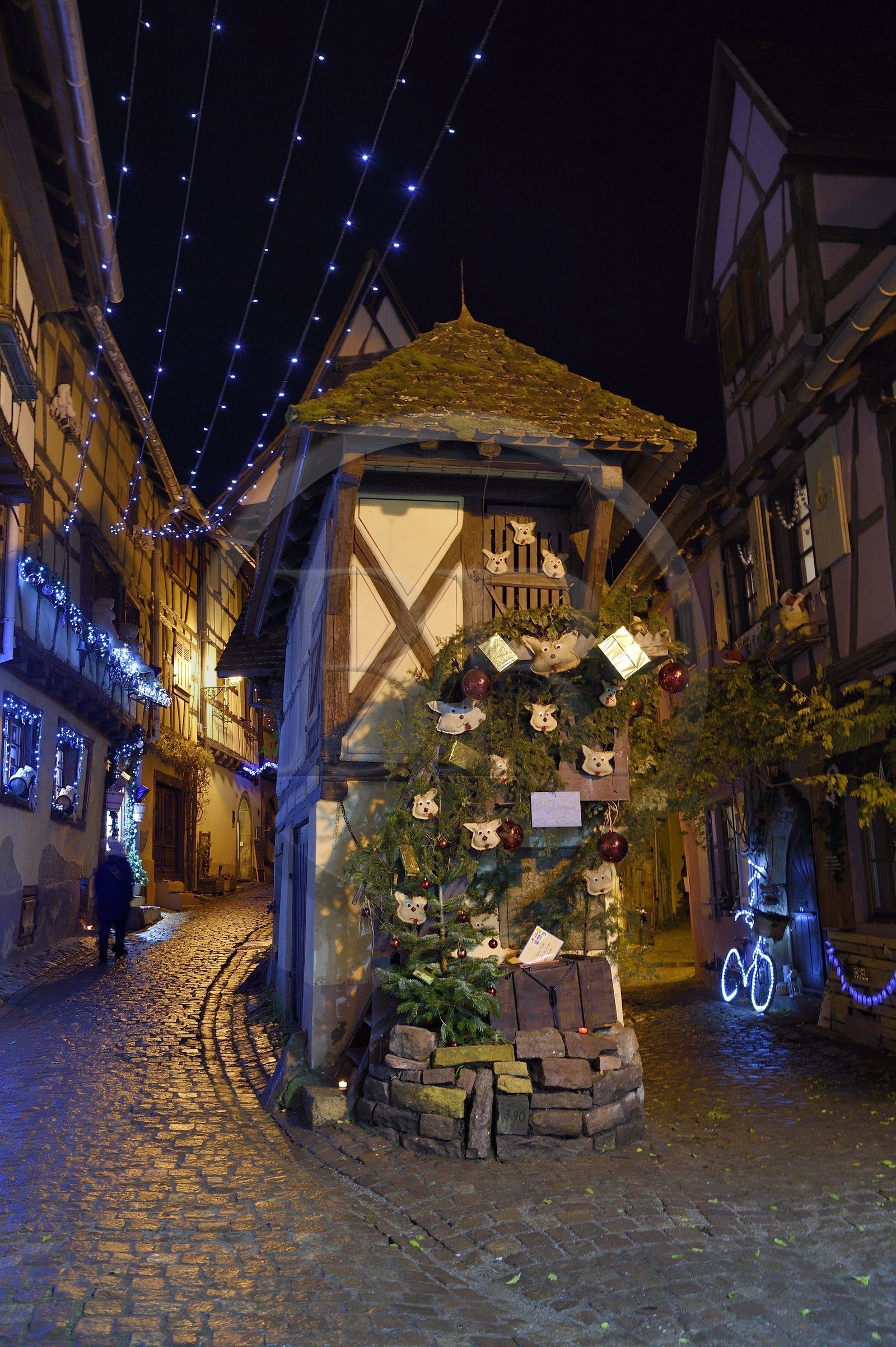 France, Haut Rhin, Eguisheim, labelized Les Plus Beaux Villages de France (the Most Beautiful Villages of France), Ruelle des Remparts, Christmas lights and decorations