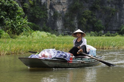 Vietnam, Ninh Binh province nicknamed Inland Halong Bay, small boat trip in Tam Coc surrounded by karstic moutains
