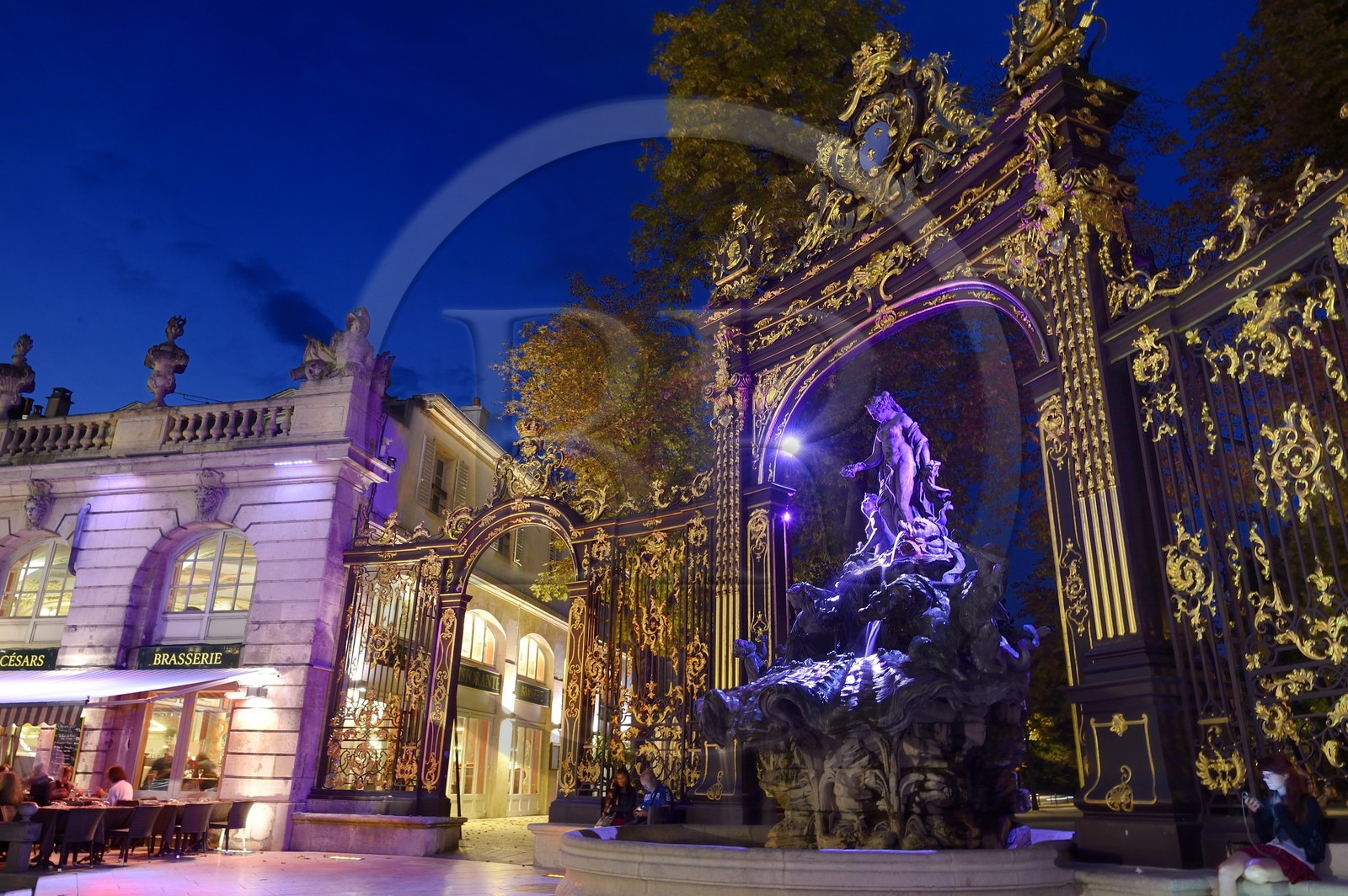 France, Meurthe-et-Moselle, Nancy, Place Stanislas (former Place Royale) built by Stanislas Leszczynski in the 18th century, listed as World Heritage by UNESCO, Amphitrite Fountain and golden gate by Jean Lamour