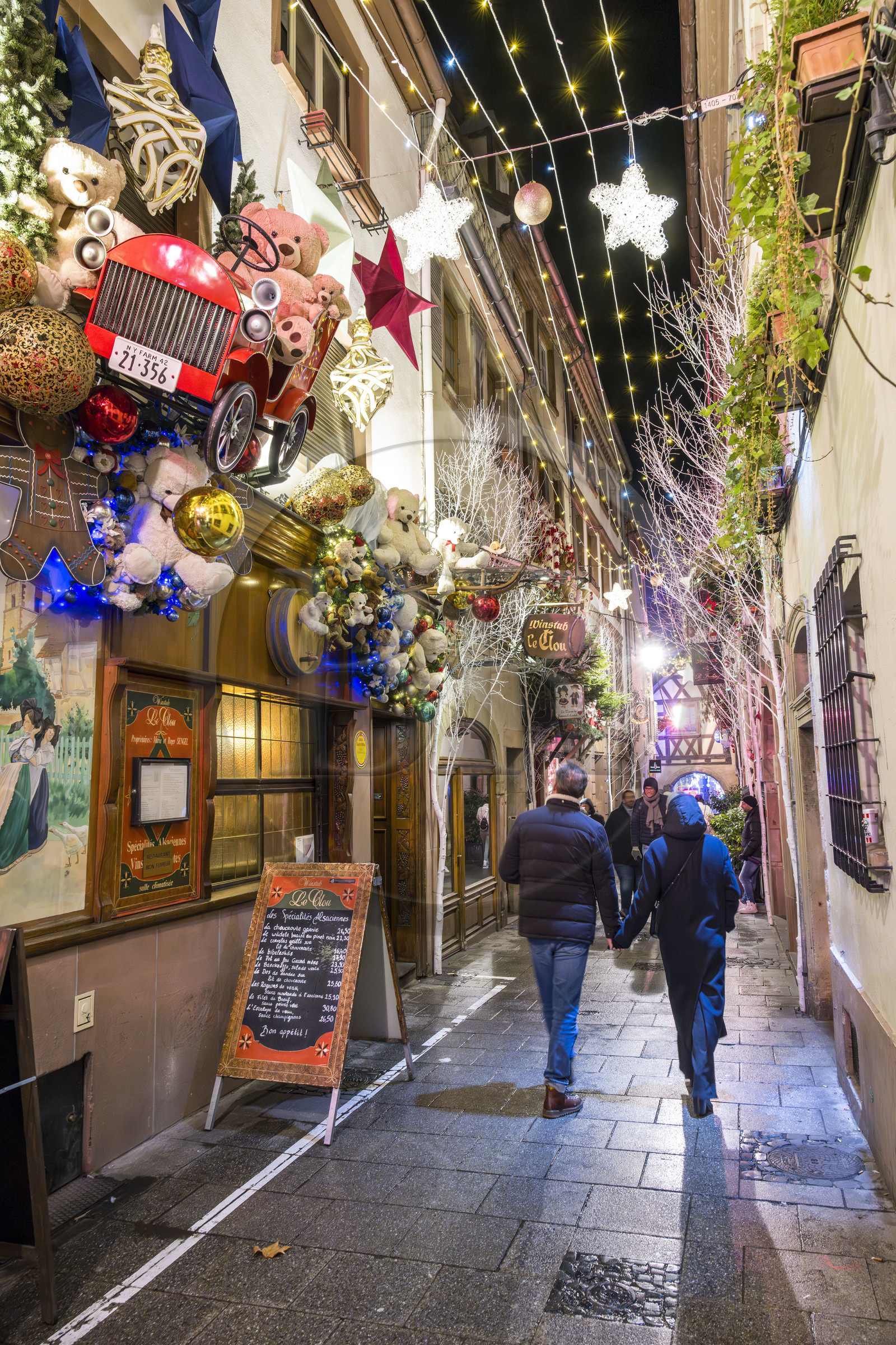 France, Bas Rhin, Strasbourg, old town listed as World Heritage by UNESCO, the winstub Le Clou in the rue du Chaudron with its Christmas decorations