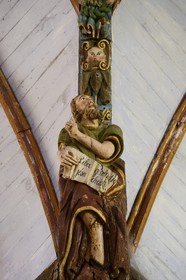 France, Finistere, Pleyben church, wooden painted sculptures on the stringer decorating the vault