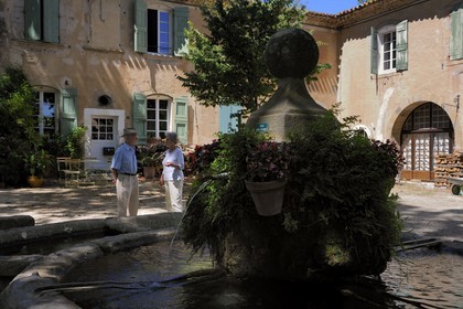 France, Herault, Villeneuvette, former Royal factory, the fountain on the place Louis XIV set up for the washerwomen