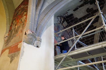 France, Haute Loire, Le Puy en Velay, Routes of Santiago de Compostela in France listed as World heritage by UNESCO, the Hotel-Dieu, chapel of the Holy Spirit, art restorer Annalisa Odoardi restores 17th century mural