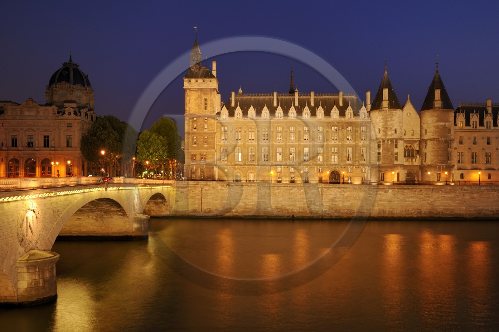 France, Paris, banks of the Seine river listed as World Heritage by UNESCO, the Conciergerie on the City island and the pont au Change (Change bridge)